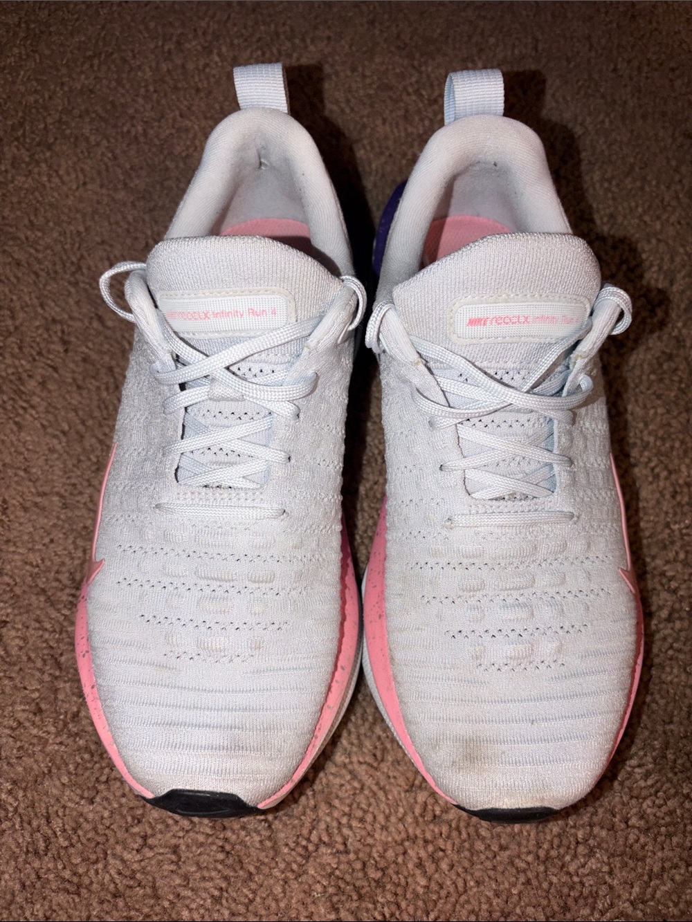Nike Women’s React Infinity Run 4
Light Blue with Pink & Purple Accents - Picture 2 of 11